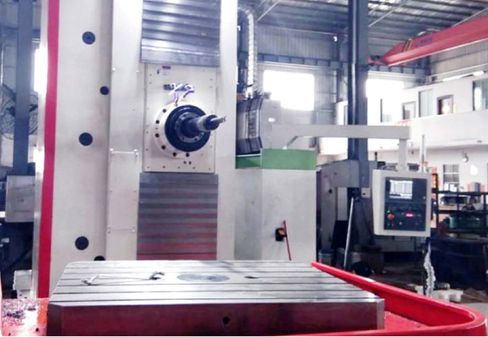 Planer type milling and boring machining center